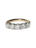 A five-stone diamond ring with a yellow gold band, featuring round brilliant-cut diamonds set in a silver-colored prong setting on a plain white background.